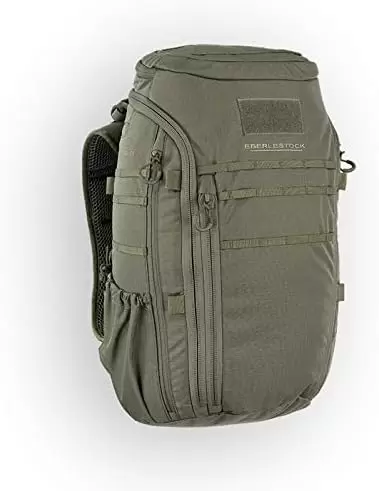 Compact olive green tactical backpack featuring multiple zippered compartments and adjustable straps, ideal for outdoor activities and gear organization.